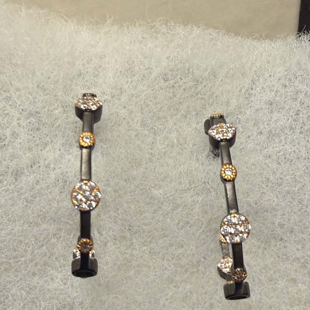 Freida ROTHMAN signature floral station hoop earrings.